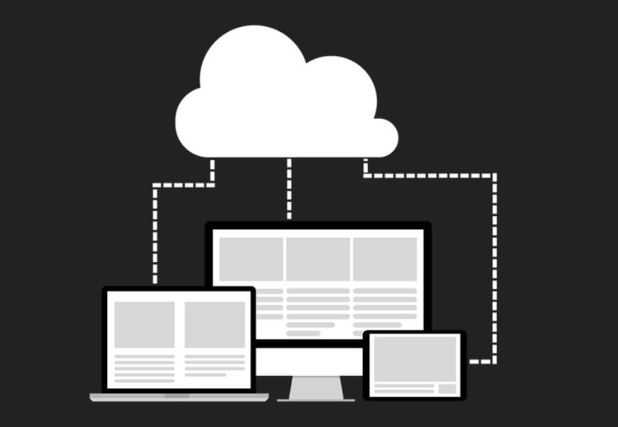Graphic of multiple computing devices connected to a cloud