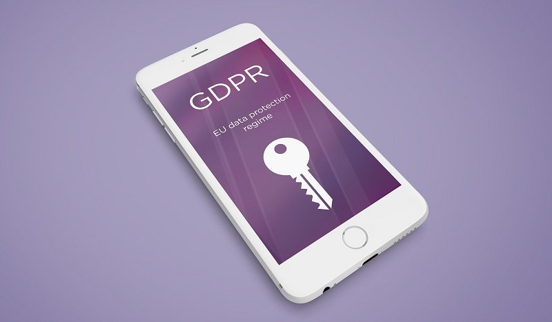 A mobile phone with screen message "GDPR - EU data protection regime"